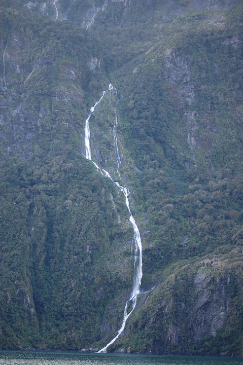 This is a view of Palisade Falls that shows much of the 262 foot / 80 meter drop into Milford Sound.