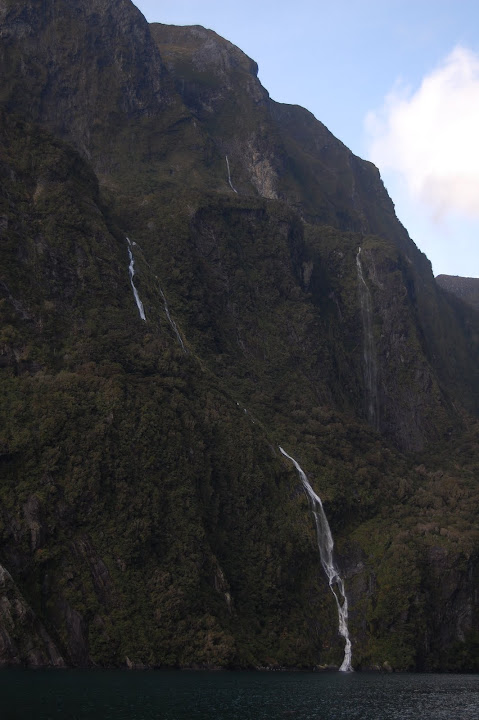 This is a view of Palisade Falls where two drops can be seen, but not the middle portion of the 262 foot / 80 meter drop into Milford Sound.