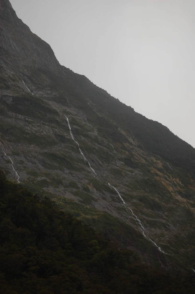 This is one of the many waterfalls in The Valley of a Hundred Falls. These falls cascade down cliffs and are hundreds of feet / meters tall.