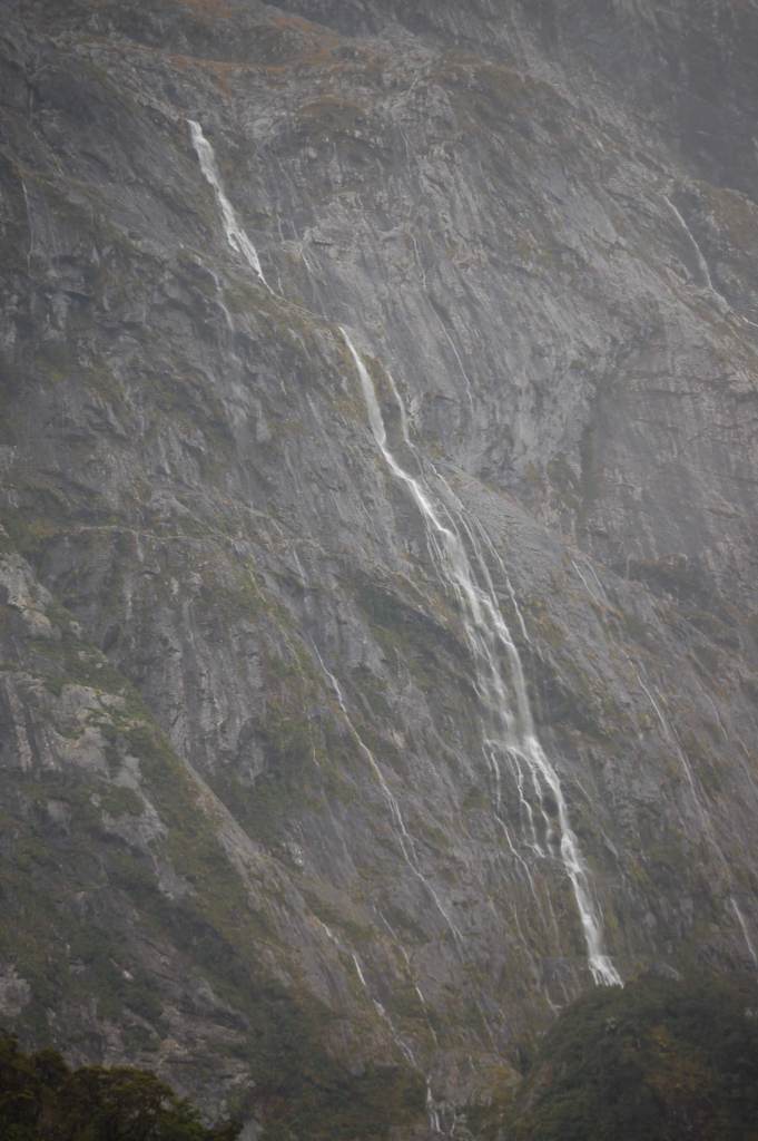 This is one of the many waterfalls in The Valley of a Hundred Falls. These falls cascade down cliffs and are hundreds of feet / meters tall.