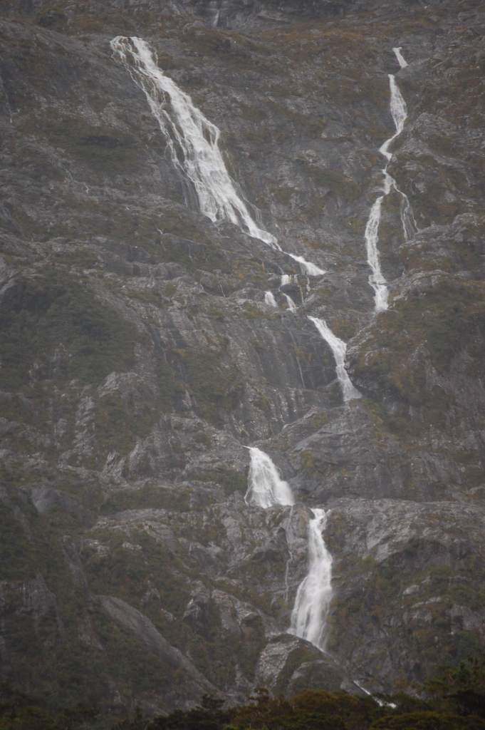 This is one of the many waterfalls in The Valley of a Hundred Falls. These falls cascade down cliffs and are hundreds of feet / meters tall.