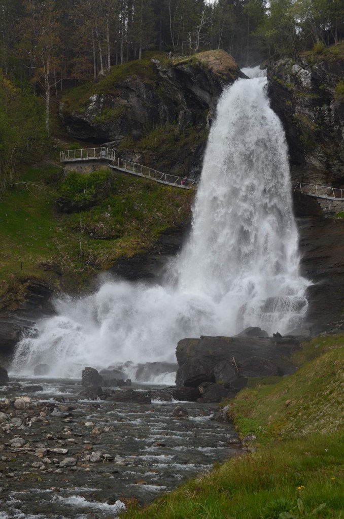 Steinsdalsfossen is a 160 foot / 49 meter tall waterfall in Norway. A trail/stairway leads behind the falls.