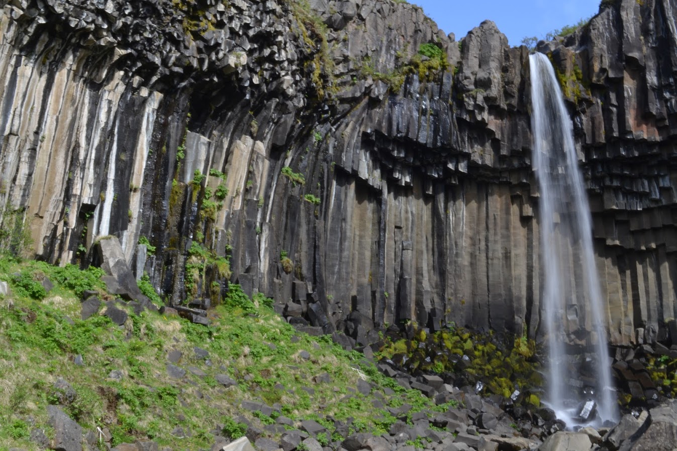 Svartifoss is a 66 foot / 20 meter tall waterfall. While the waterfall isn't wildly tall, the rocks around the falls look almost architectural, as if a master stonemason carved the pillars by hand rather than leaving them to the whims of cooling magma.