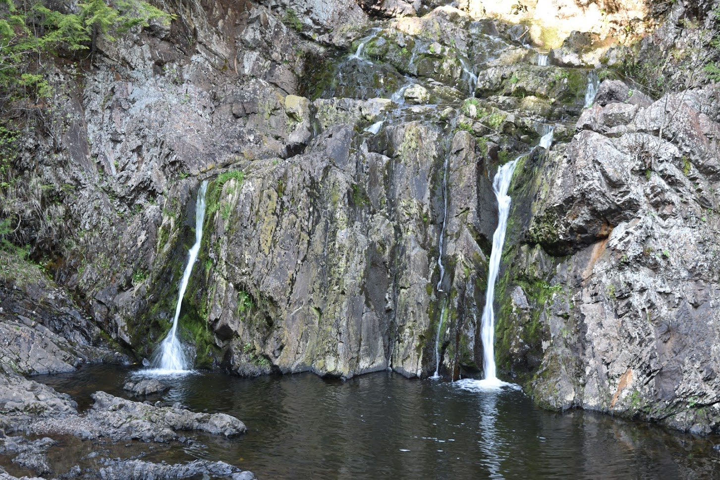 Joseph Howe Falls is a 15 foot / 5 meter tall waterfall. When I visited, there was only a small amount of water flowing with two separate narrow flows entering a pool at the base.