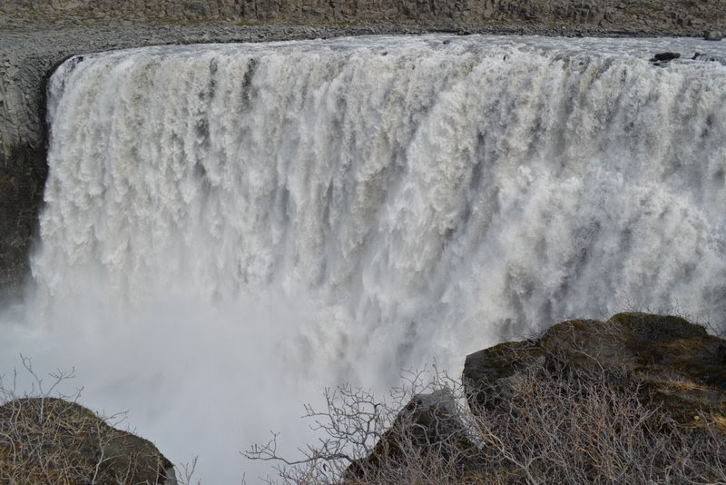 Dettifoss is a massive waterfall in northern Iceland. The waterfall is 144 feet / 44 meters tall but an even more impressive 330 ft / 100 meters wide and there is an amazing amount of waterfall flowing over the waterfall in June 2012.