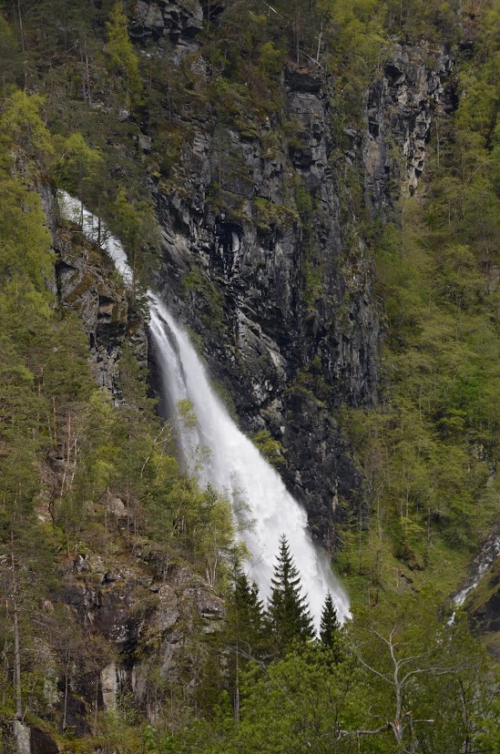 Skarvefossen is a 390 foot / 119 meter tall waterfall in Norway that can be viewed from the road.
