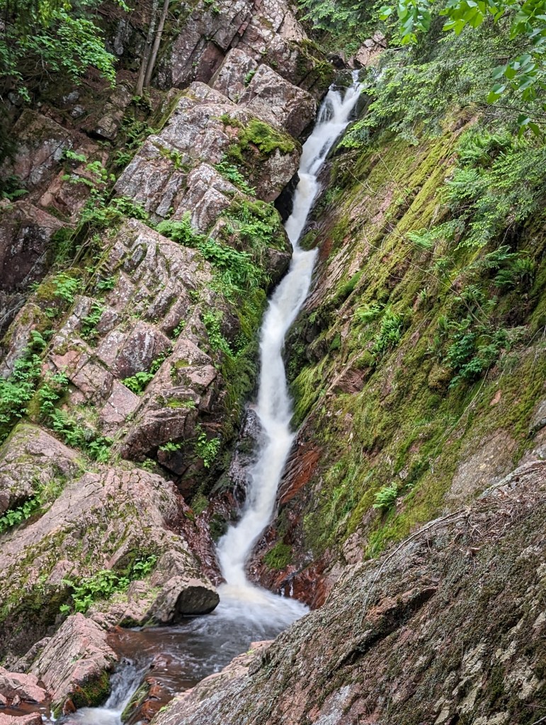 This is Morgan Falls in upper Wisconsin. This is a 70 foot tall waterfall, which is surrounded by beautiful, moss covered rocks. 