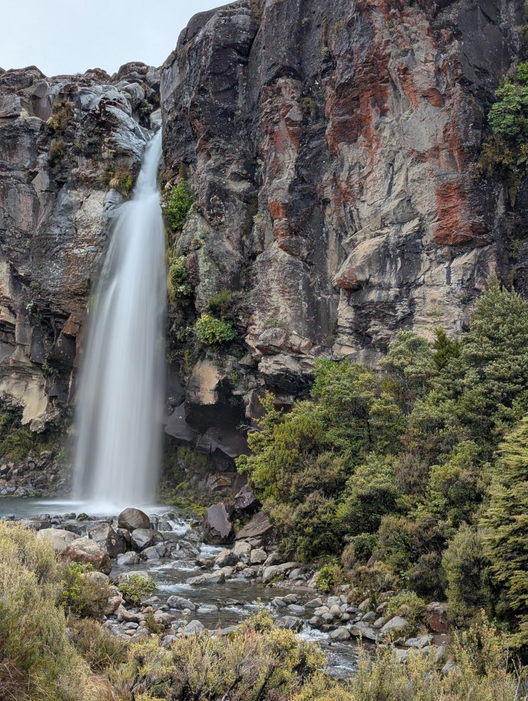Taranaki Falls is a 66 foot / 20 meter waterfall in Tongariro National Park, New Zealand.
