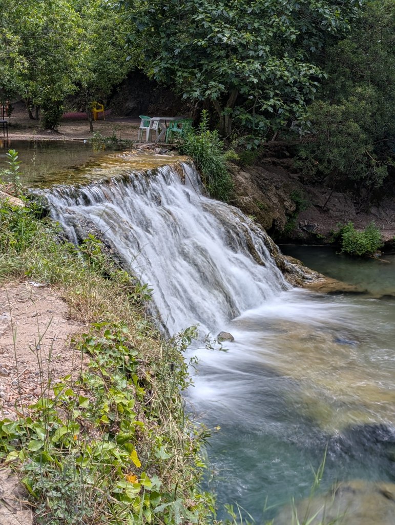 This is one of the drops that is considered the Aziz Cascades, a waterfall in northern Morocco. This drop is about 10 feet or 3 meters tall.