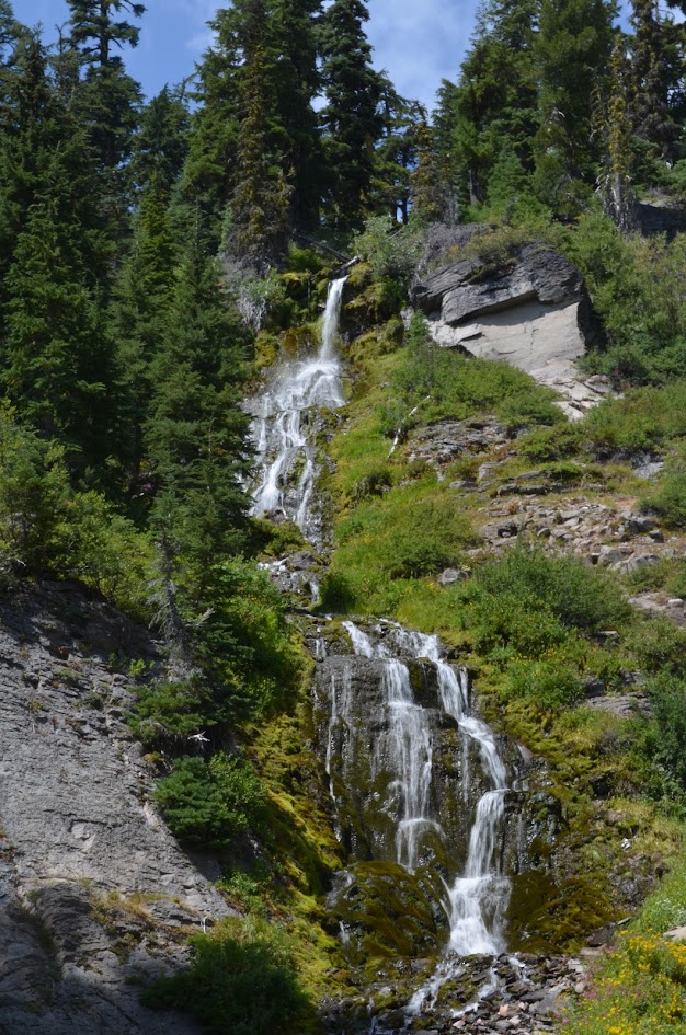 Vidae Falls is a 115 foot / 35 meter tall waterfall along a crater/ridge in Crater Lake National Park in Oregon. It isn't wide and the water cascades down the cliffside.