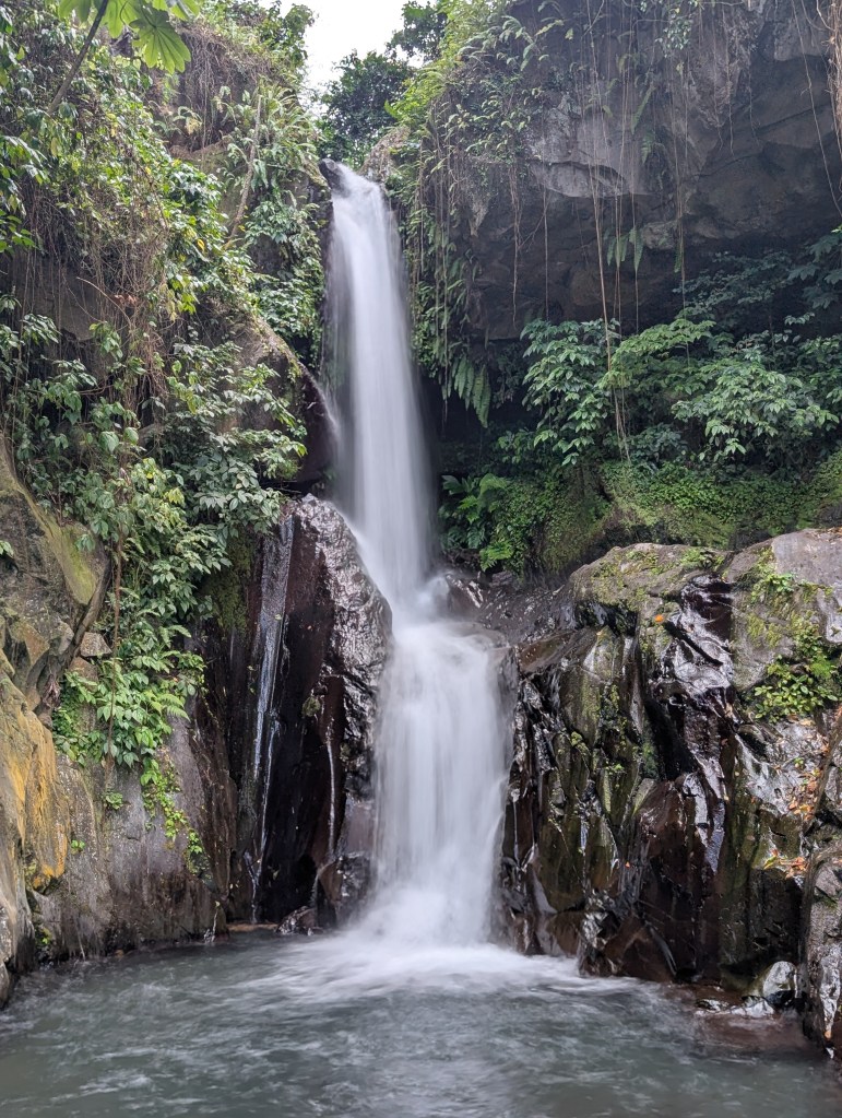 This is one of the waterfalls in Owia. It is approximately 25 feet or 8 meters tall and has two drops.